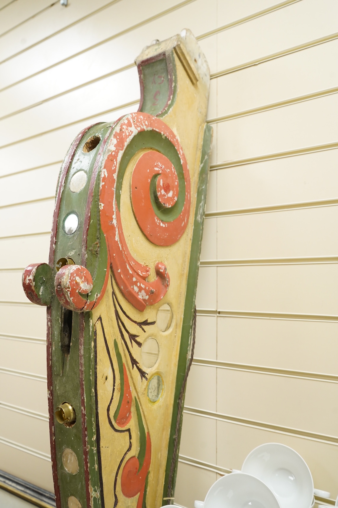 A painted wood carousel rail with light fittings, 185cm high